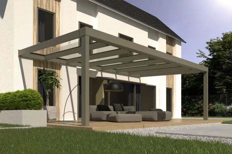 Classic L Plus vor Einfamilienhaus Classic L Plus in Bronze-Grau vor einem Einfamilienhaus mit Lounge-Möbeln